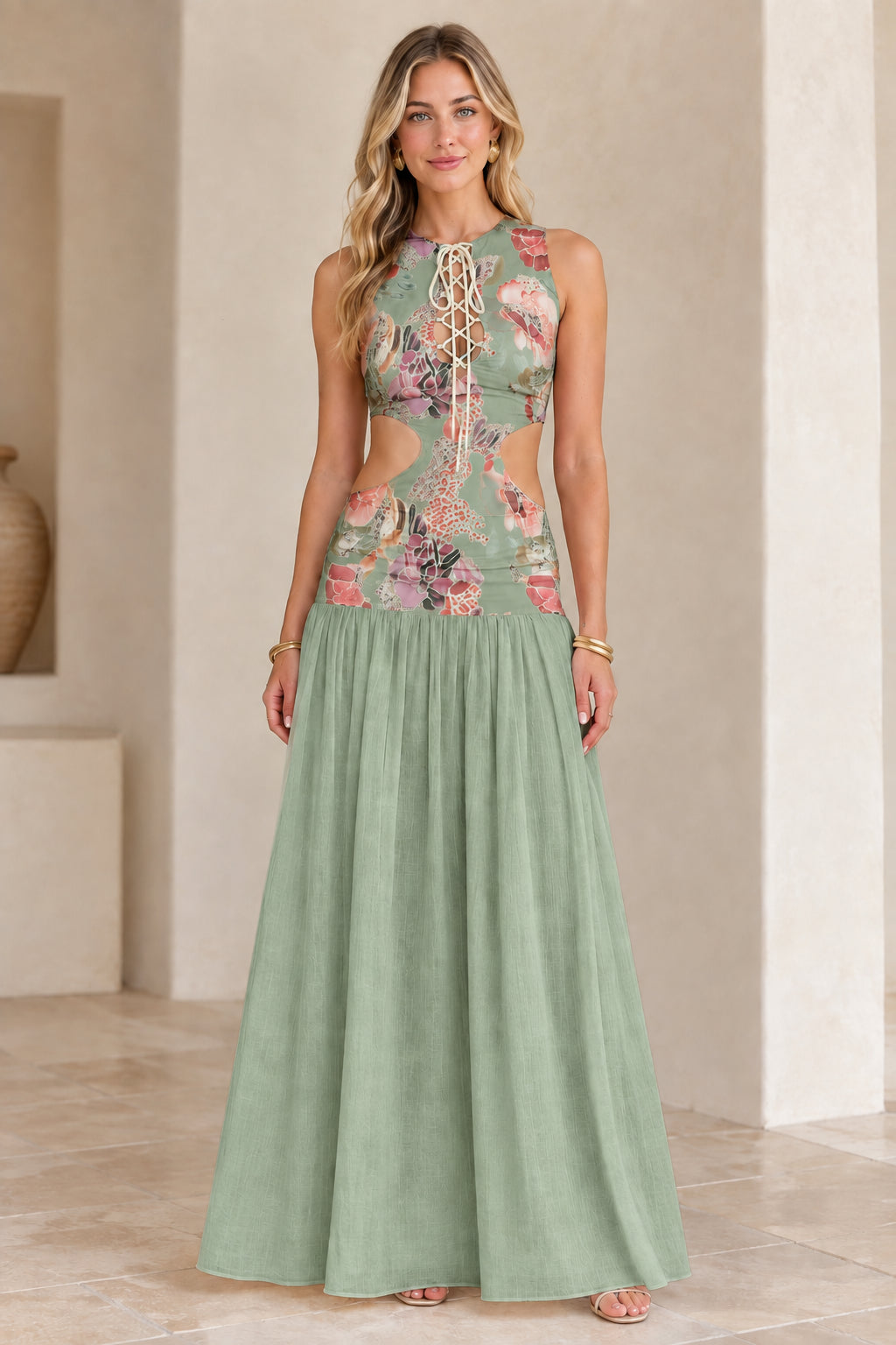 Model wearing Sage Green floral cutout lace-up maxi dress