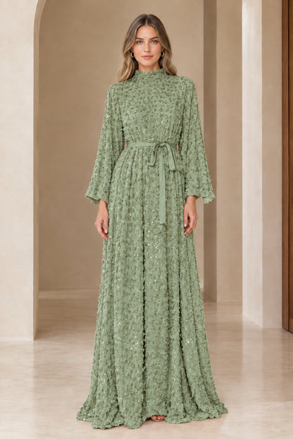 Front full view of sage green textured sequin mock neck maxi dress