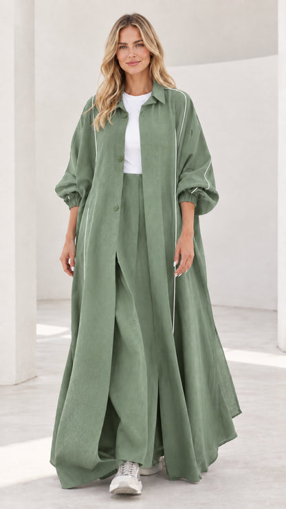 Woman wearing sage green lightweight maxi duster and wide leg pants set