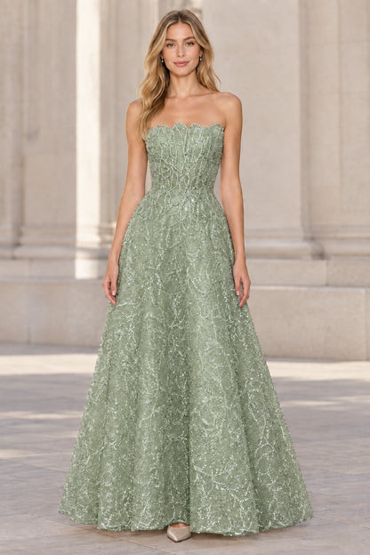 Front view of model wearing sage green strapless embellished A-line evening gown