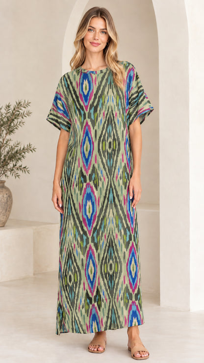 Woman wearing Sage Green Multi print relaxed maxi kaftan dress