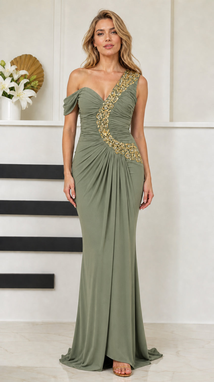 Front view of woman wearing sage green one-shoulder crystal ruched evening dress