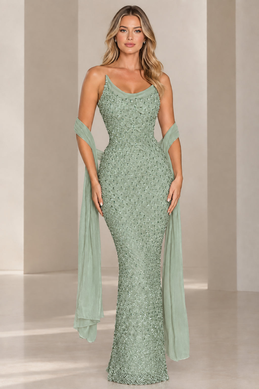 Sage green sparkling evening dress with corset detail and matching wrap