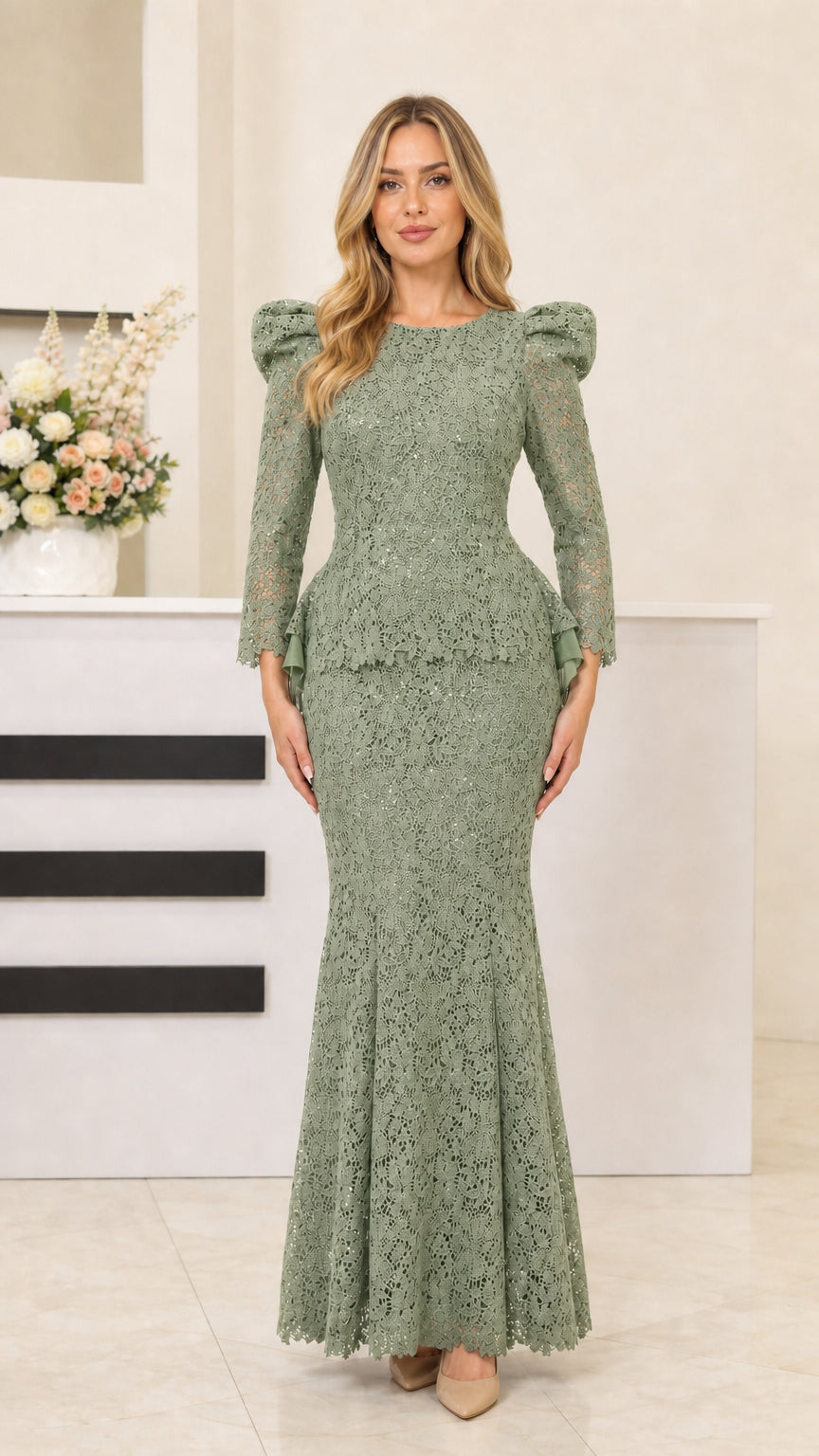 Full length view of woman in sage green lace formal dress