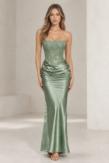 Front view of woman wearing sage green strapless lace corset satin evening dress