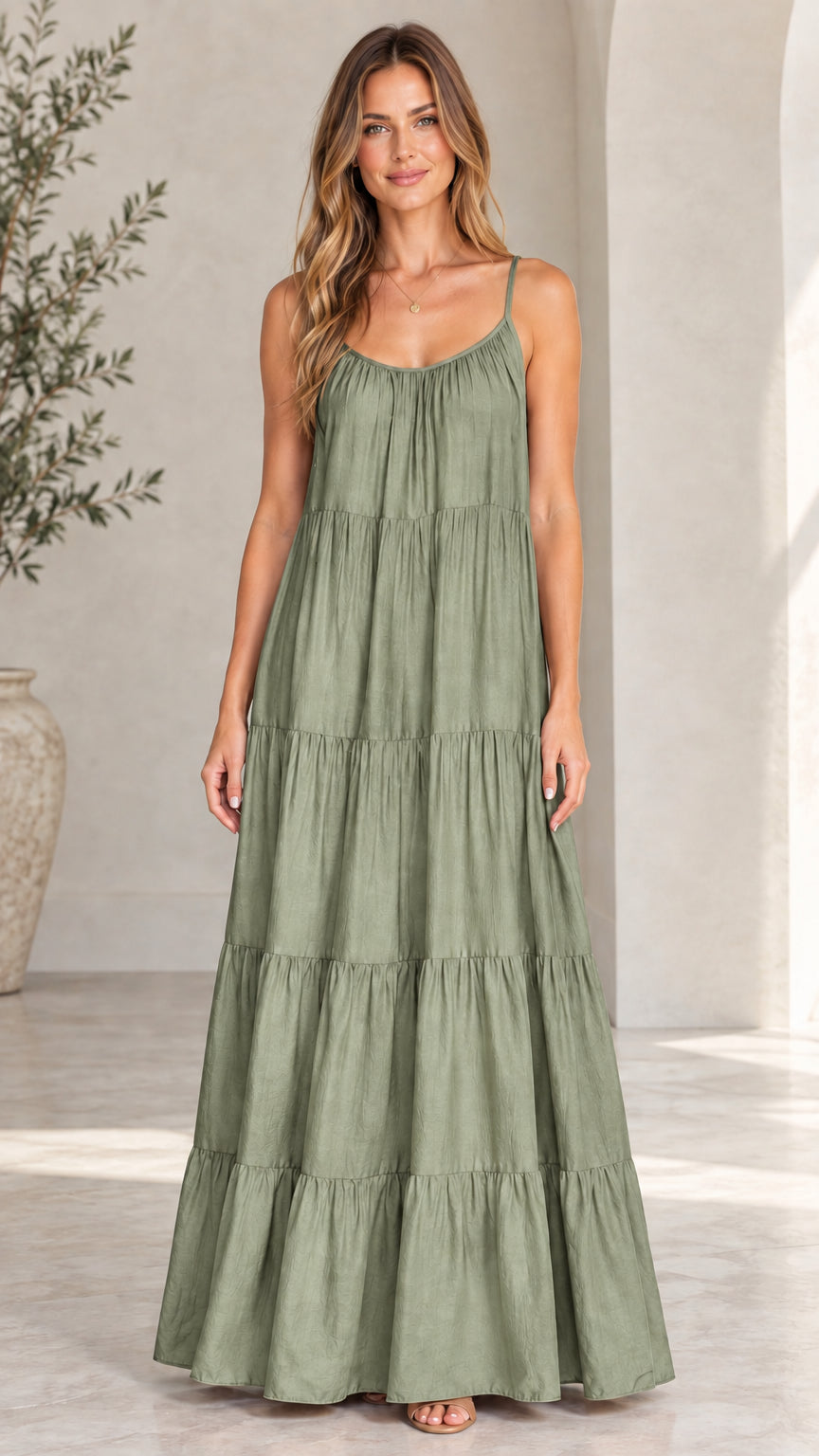 Front view of model wearing sage green tiered sleeveless maxi dress