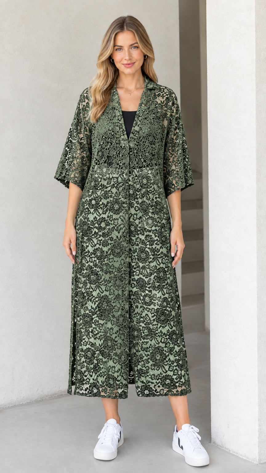 Front view of model wearing sage green floral lace midi duster dress