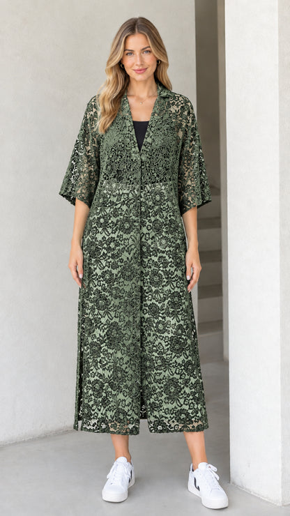Front view of model wearing sage green floral lace midi duster dress