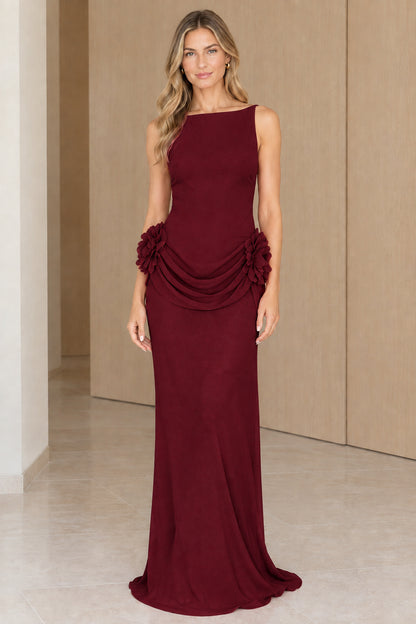Front view of rich burgundy sleeveless low-back formal gown