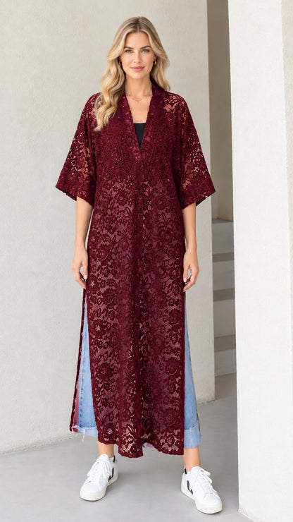 Front view of model wearing burgundy wine red floral lace maxi duster cardigan