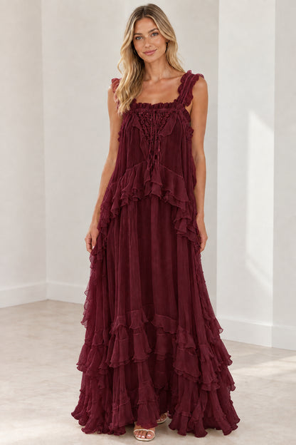 Model wearing burgundy wine tiered ruffle lace-up maxi dress