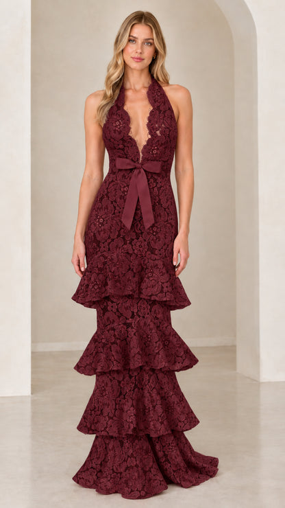 Front view of model wearing Burgundy wine halter tiered floral lace maxi gown
