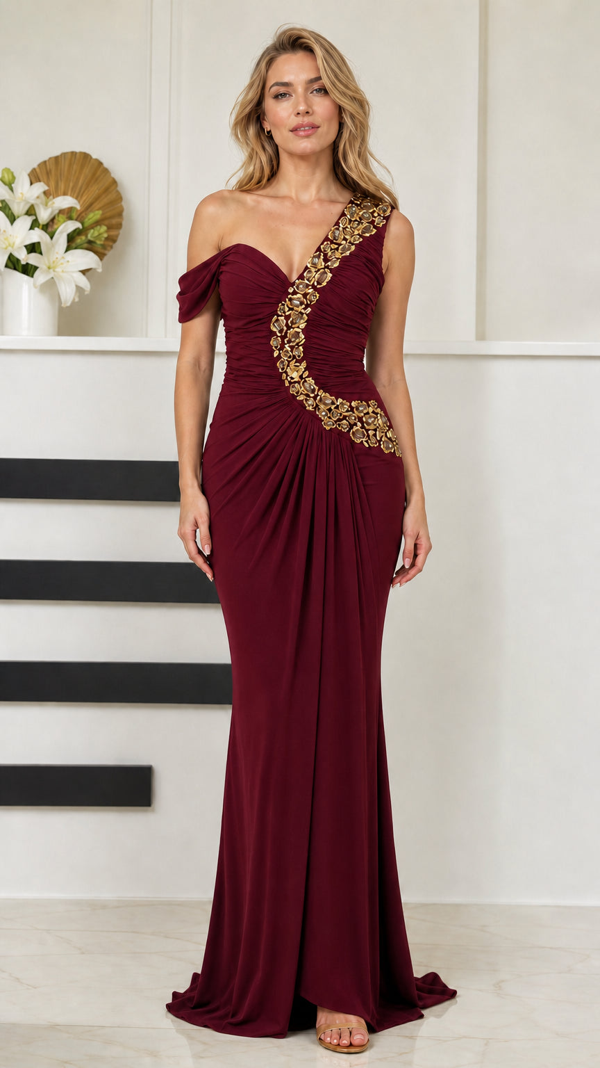 Front view of woman wearing burgundy wine red one-shoulder beaded mermaid gown