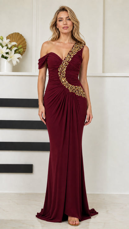 Front view of woman wearing burgundy wine red one-shoulder beaded mermaid gown