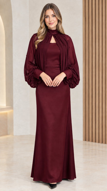 Front view of burgundy red beaded cape evening gown