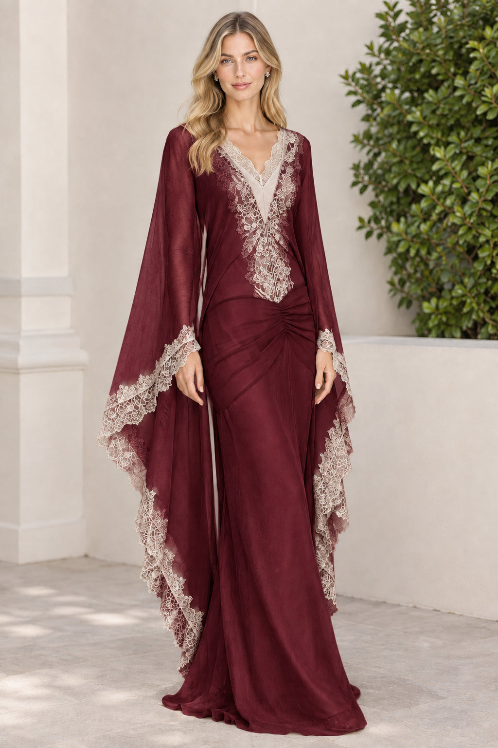 Burgundy red formal evening dress with lace V-neck and cape sleeves