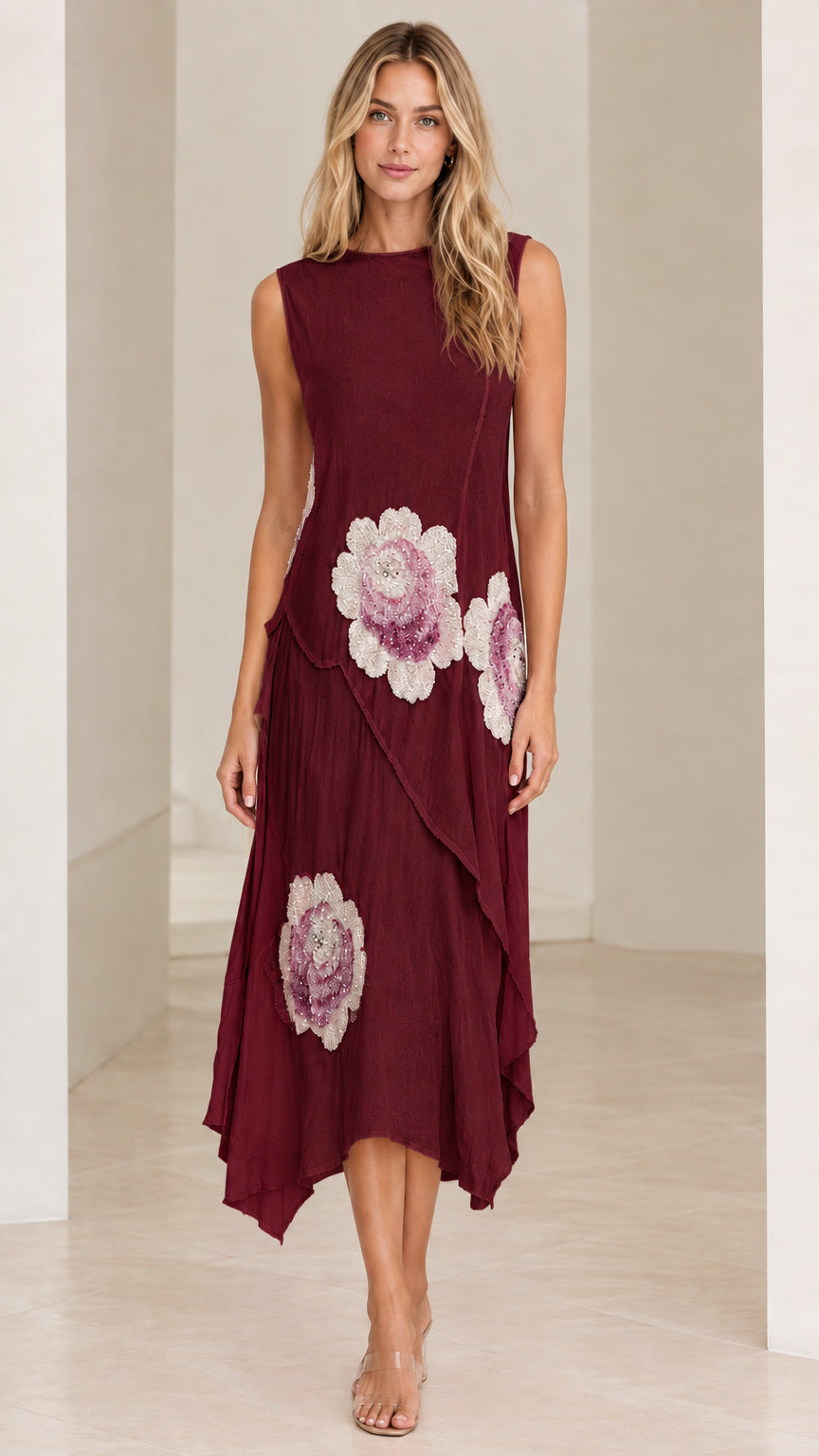 Model wearing Burgundy red sleeveless asymmetrical floral midi dress