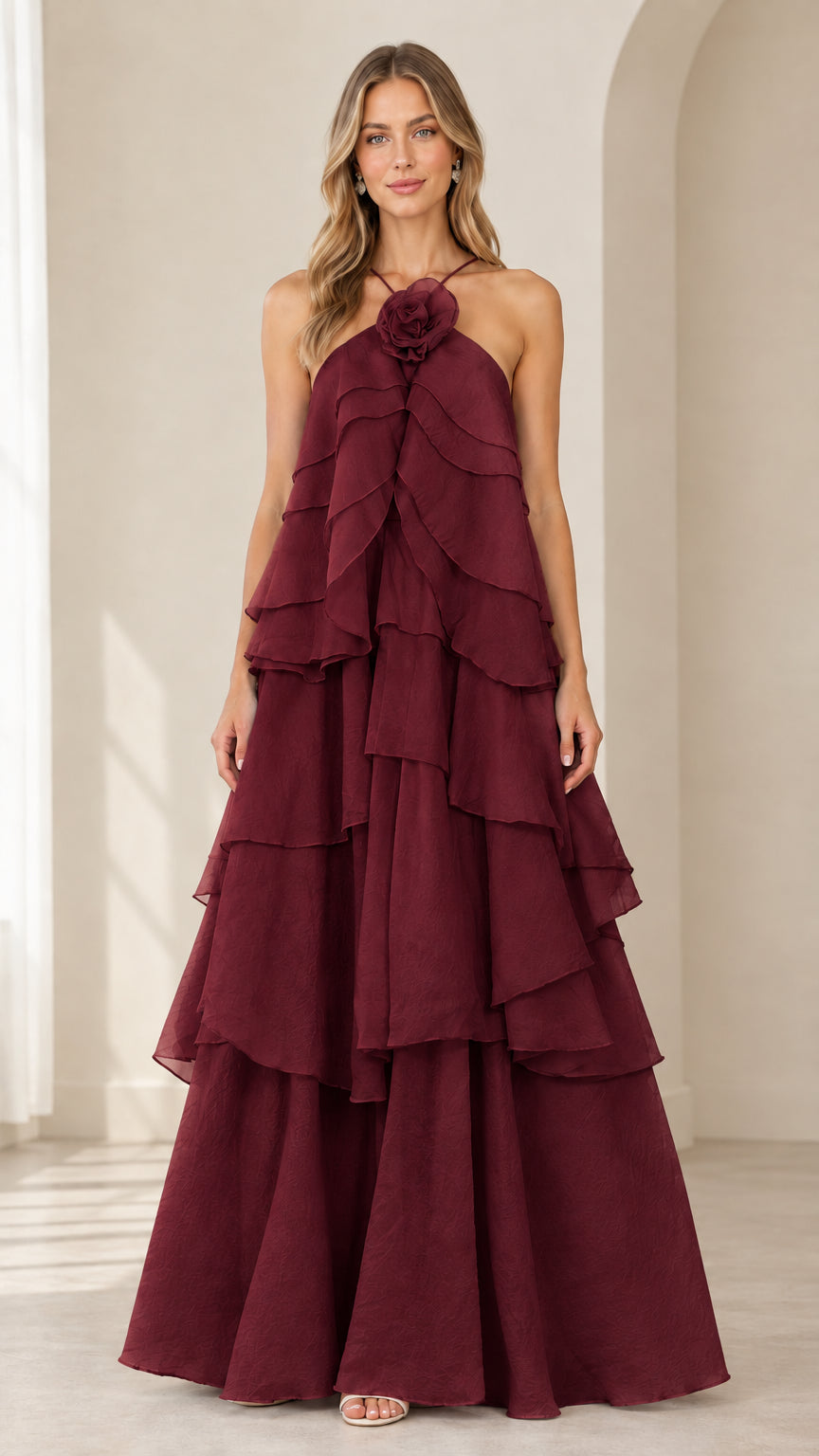 Full-length front view of model wearing Burgundy wine tiered halter evening dress