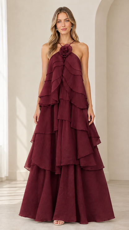 Full-length front view of model wearing Burgundy wine tiered halter evening dress