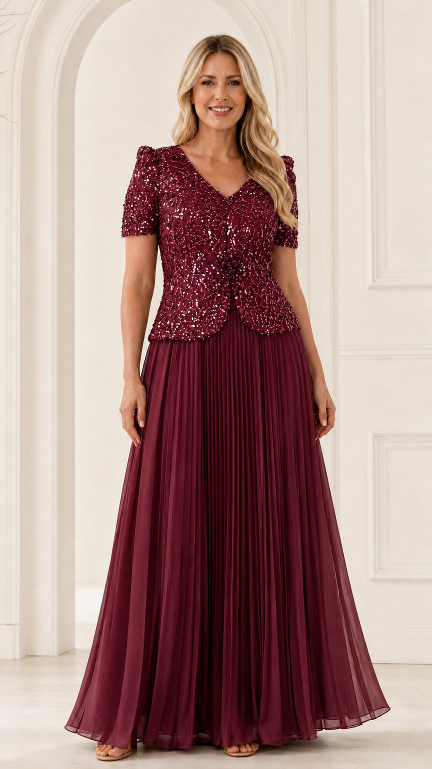 Full front view of burgundy wine sequin V-neck pleated evening gown