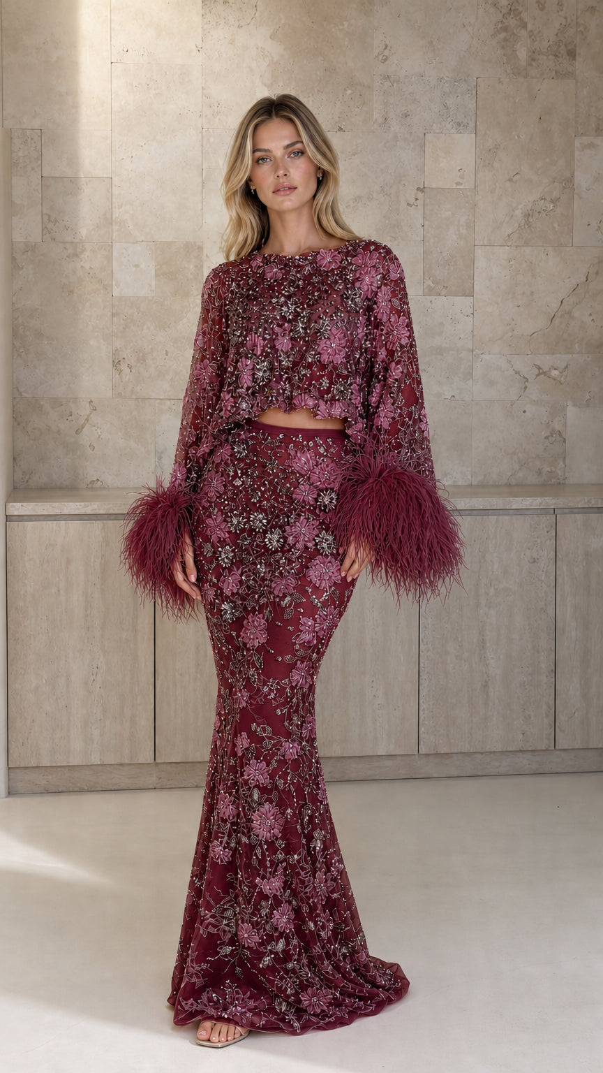 Front view of burgundy color variant of embellished feather trim two-piece set