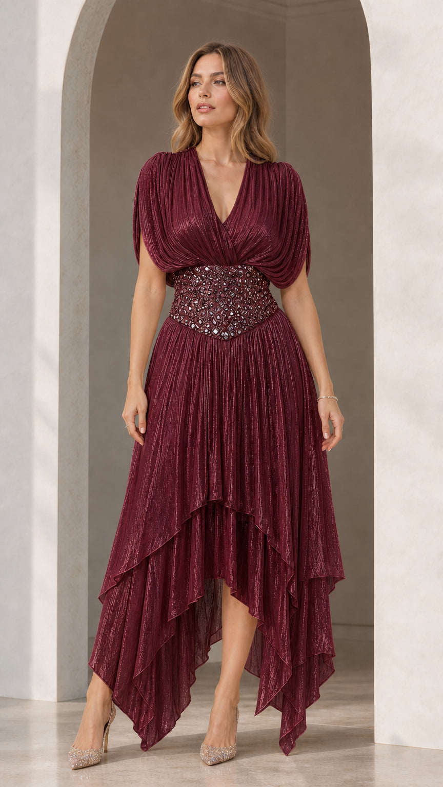 Full-length front view of Burgundy shimmer pleated high-low formal gown