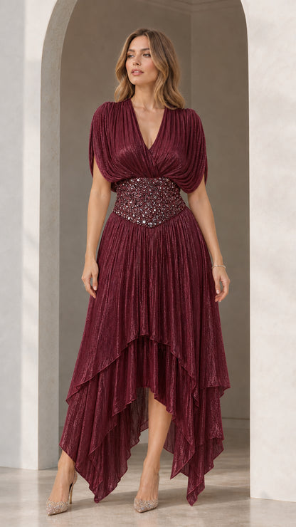 Full-length front view of Burgundy shimmer pleated high-low formal gown