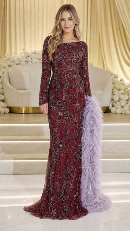 Burgundy embellished long sleeve evening gown with feather accent