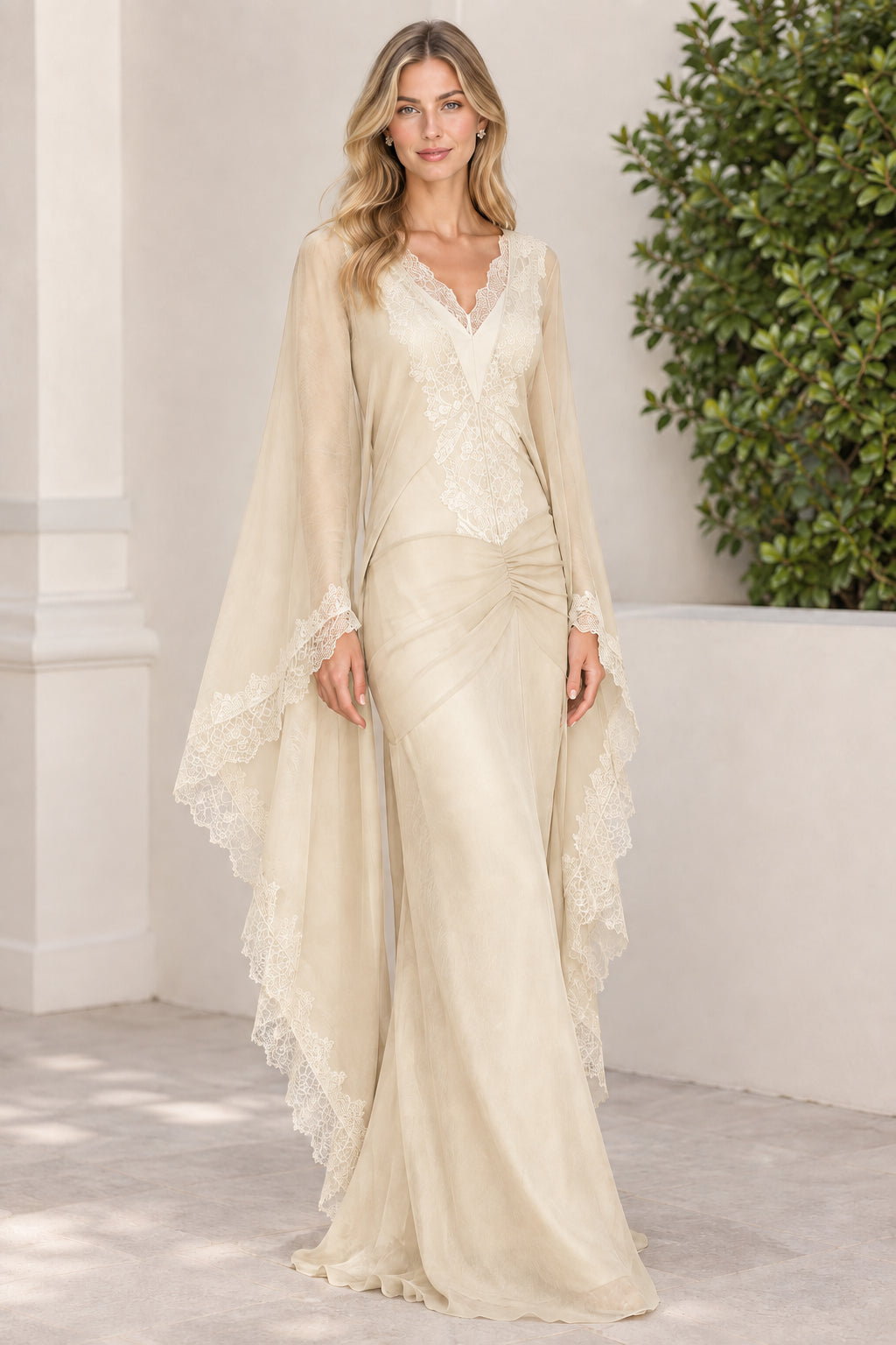 Champagne cream floor length evening gown with delicate lace trim
