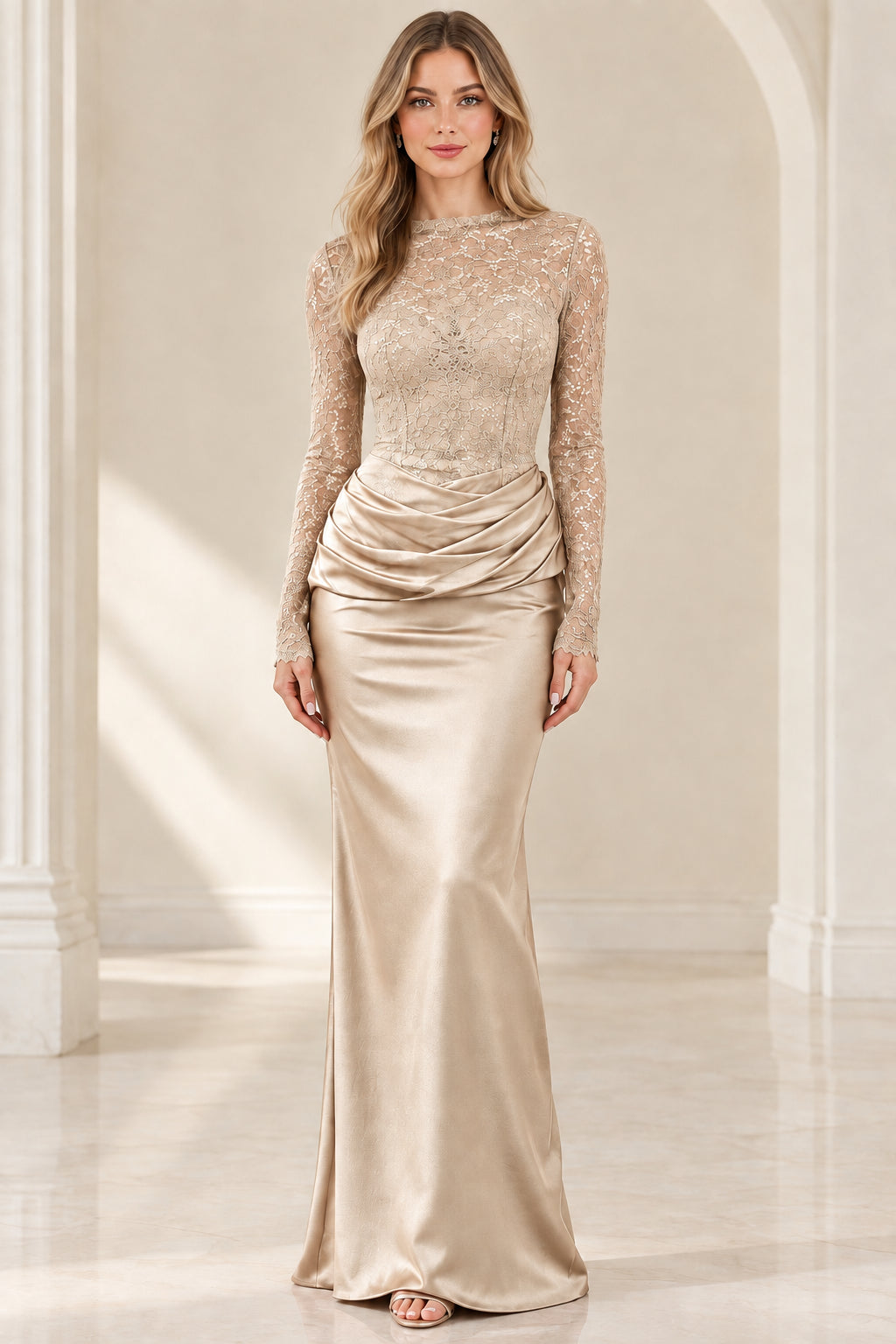 Front view of champagne gold long sleeve lace and satin mermaid dress