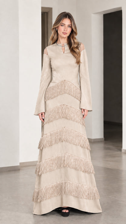 Front full view of Beige long sleeve tiered fringe maxi evening dress
