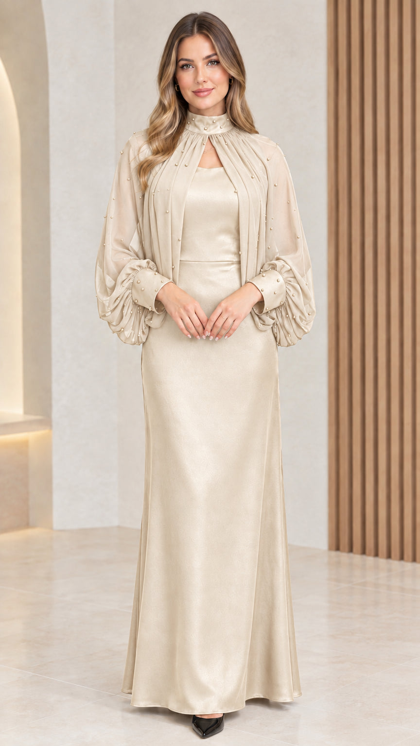 Front view of champagne beige formal maxi dress with cape overlay