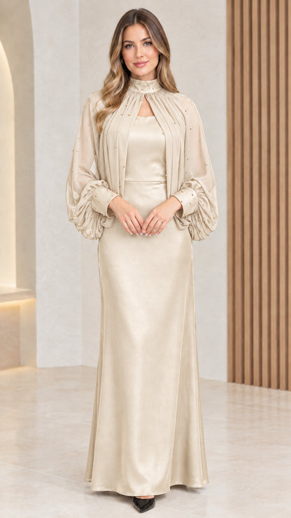 Front view of champagne beige formal maxi dress with cape overlay