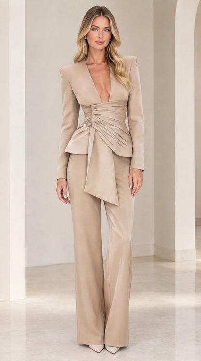 Full-length front view of beige champagne tailored pleated drape blazer and wide-leg pant suit set