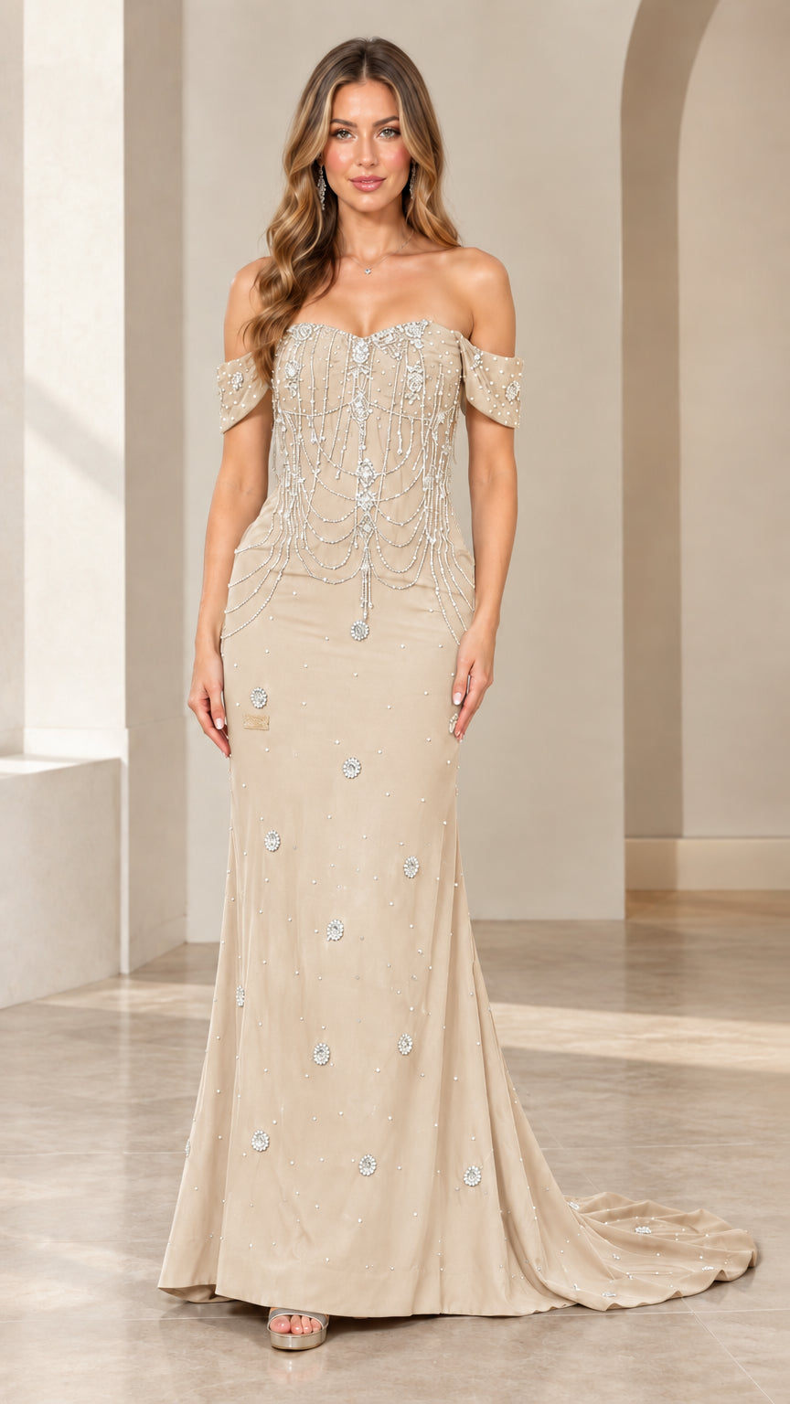 Model wearing champagne beige off-the-shoulder beaded formal evening dress