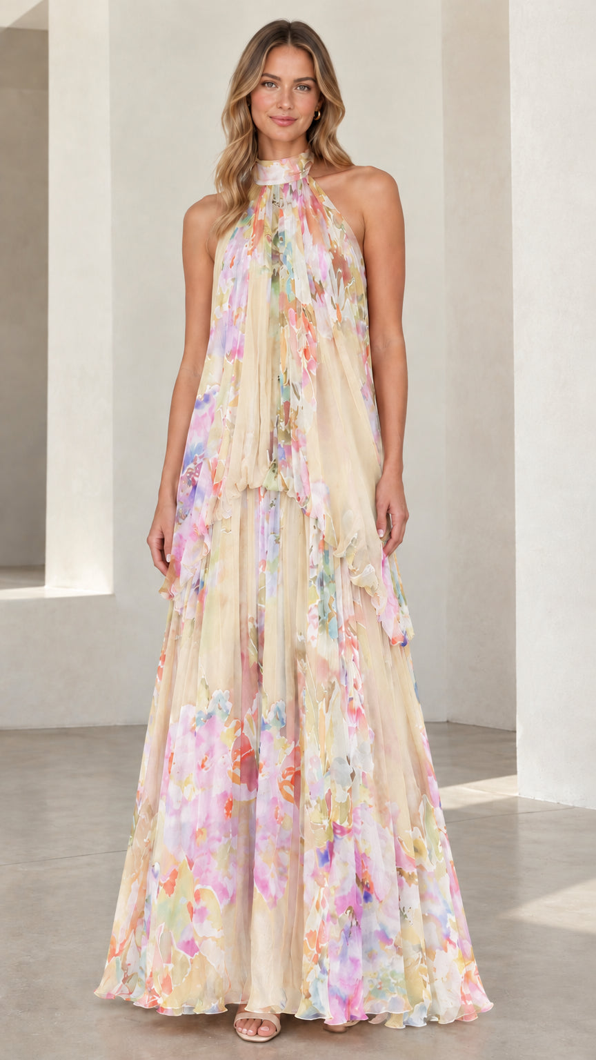Front view of champagne cream floral halter neck tiered maxi dress