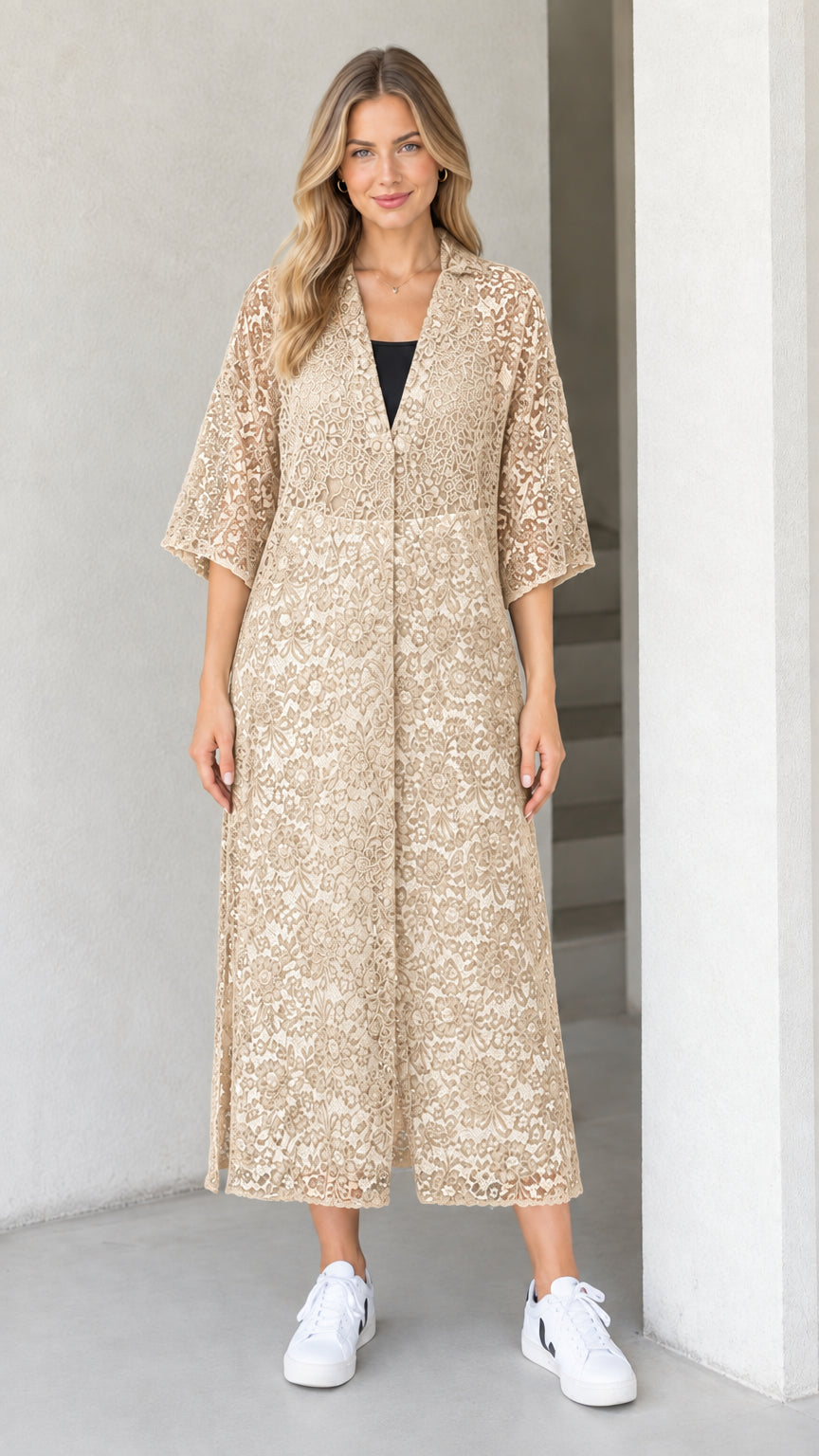Front view of model wearing champagne beige floral lace midi duster dress