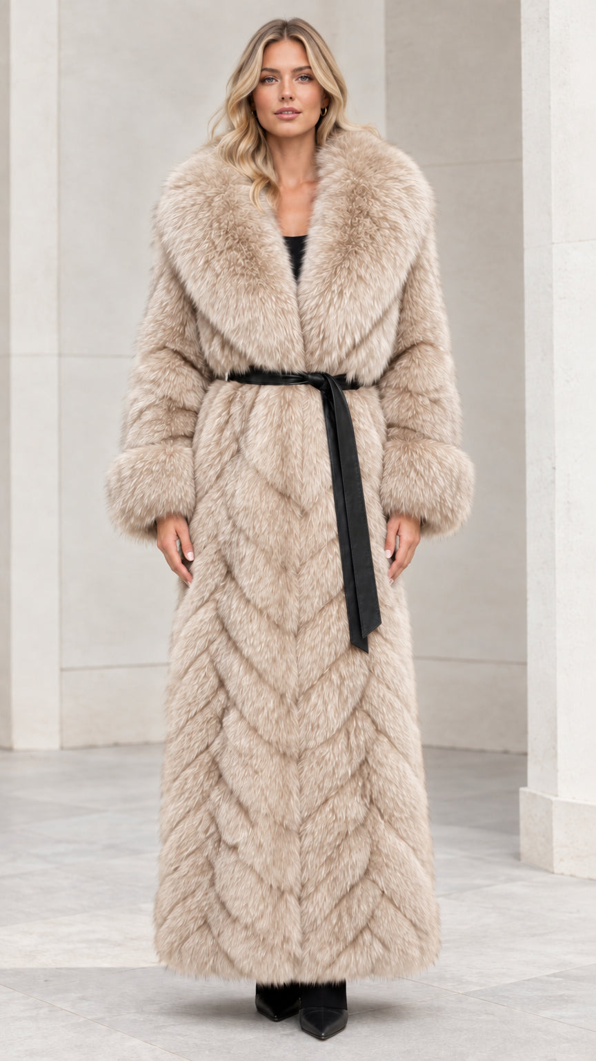 Front view of cream beige chevron faux fur maxi coat with tie belt