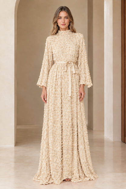 Front full view of champagne beige textured sequin belted maxi dress