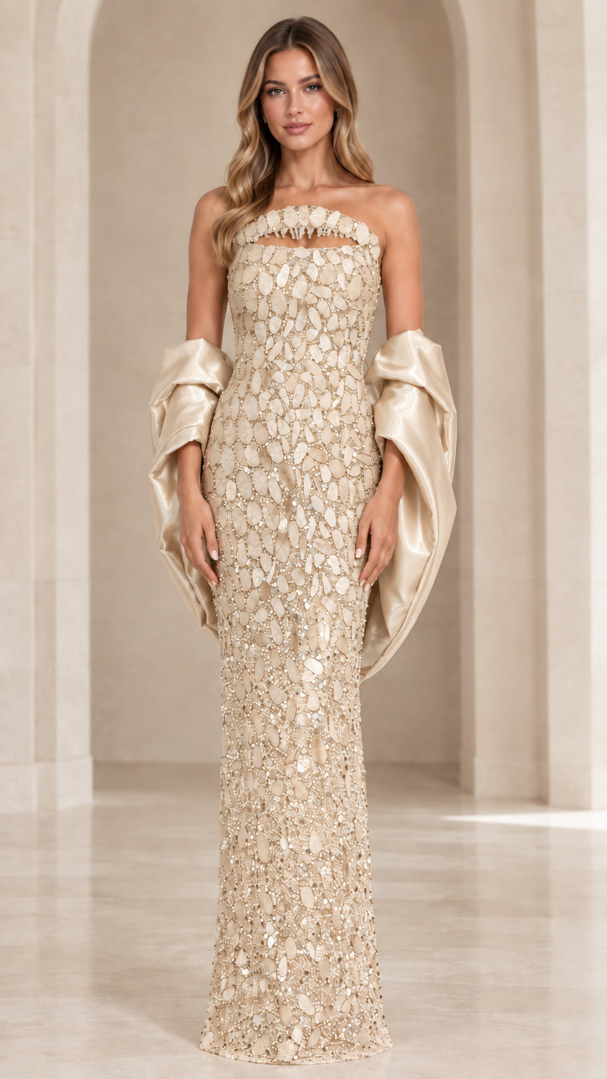 Champagne gold strapless beaded evening gown with matching satin drapes